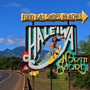 Hale'iwa North Shore welcome sign with a surfer figure